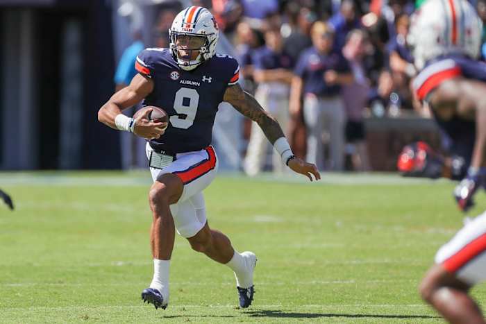 Auburn Tigers quarterback Robby Ashford (9) gains a first down during the game between the Missouri Tigers and the Auburn Tigers at Jordan-Hare Stadium on Sept. 24, 2022.